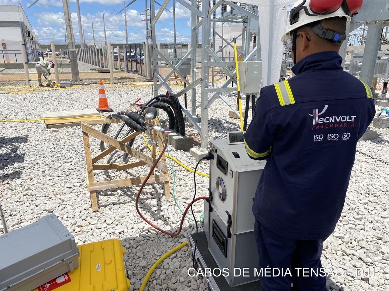 VLF cable testing in the field - Tecnvolt crew connecting the VLF test system to medium voltage cables